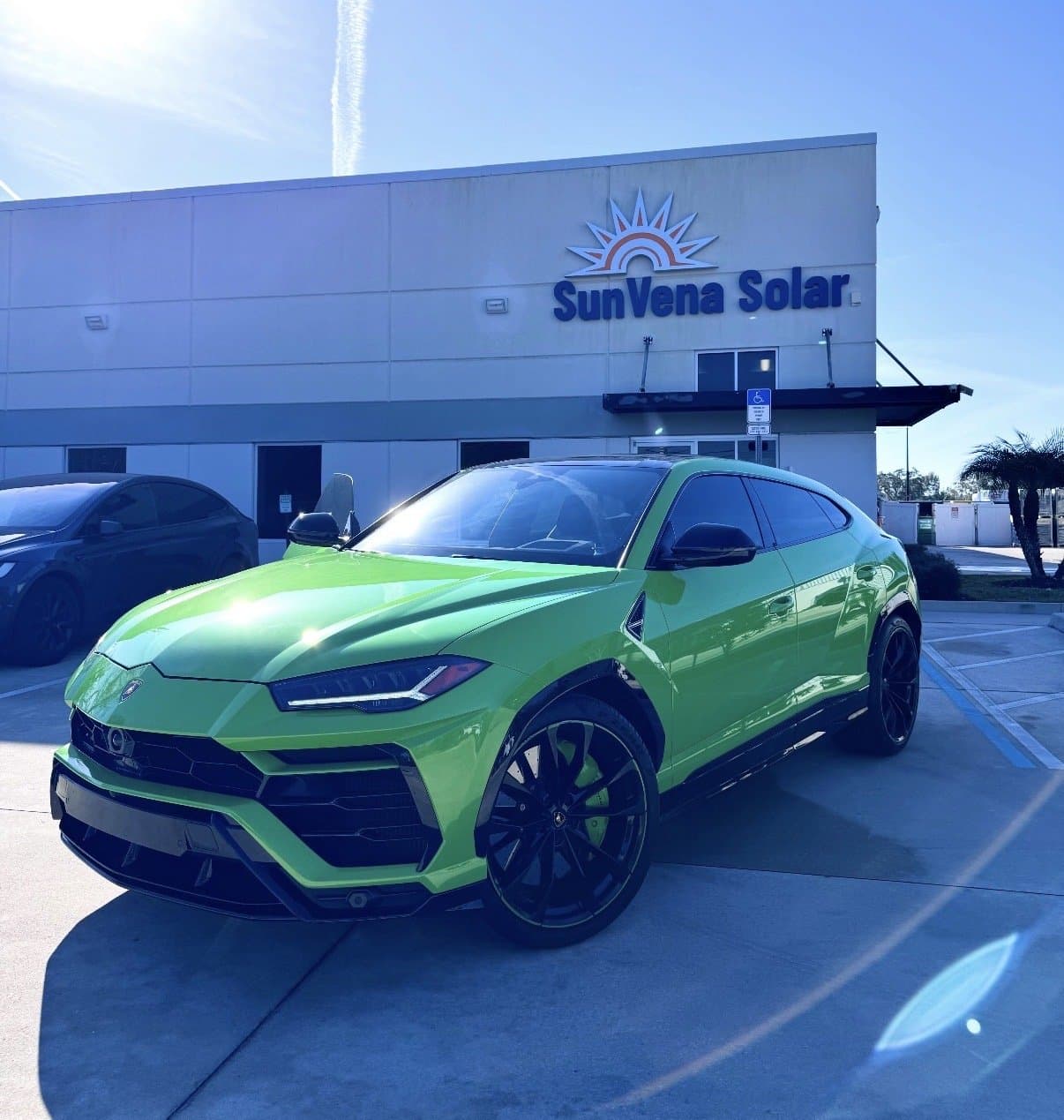 Lamborghini Urus parked in front of SunVena Solar HQ